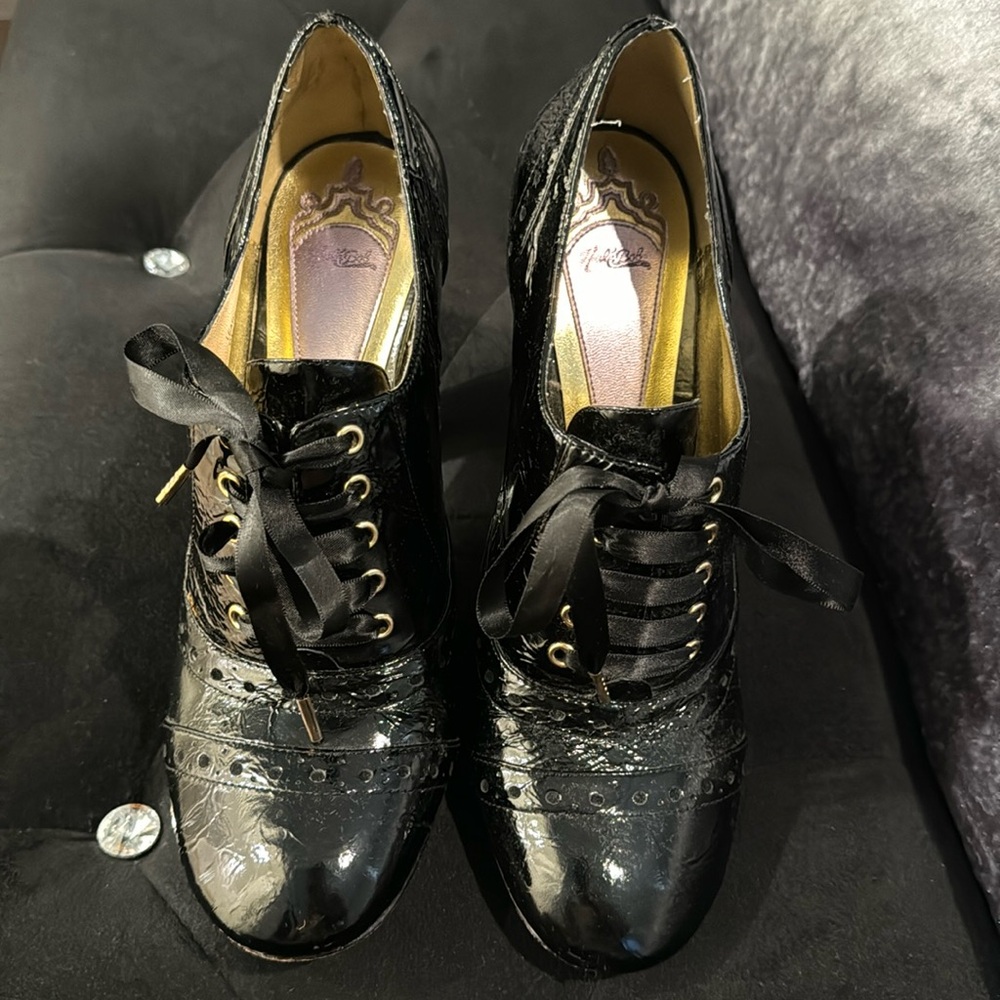 Halle Bob crinkled patent heels.